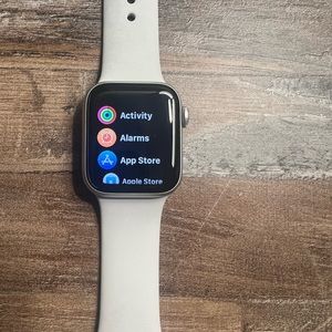 White and silver Apple Watch SE